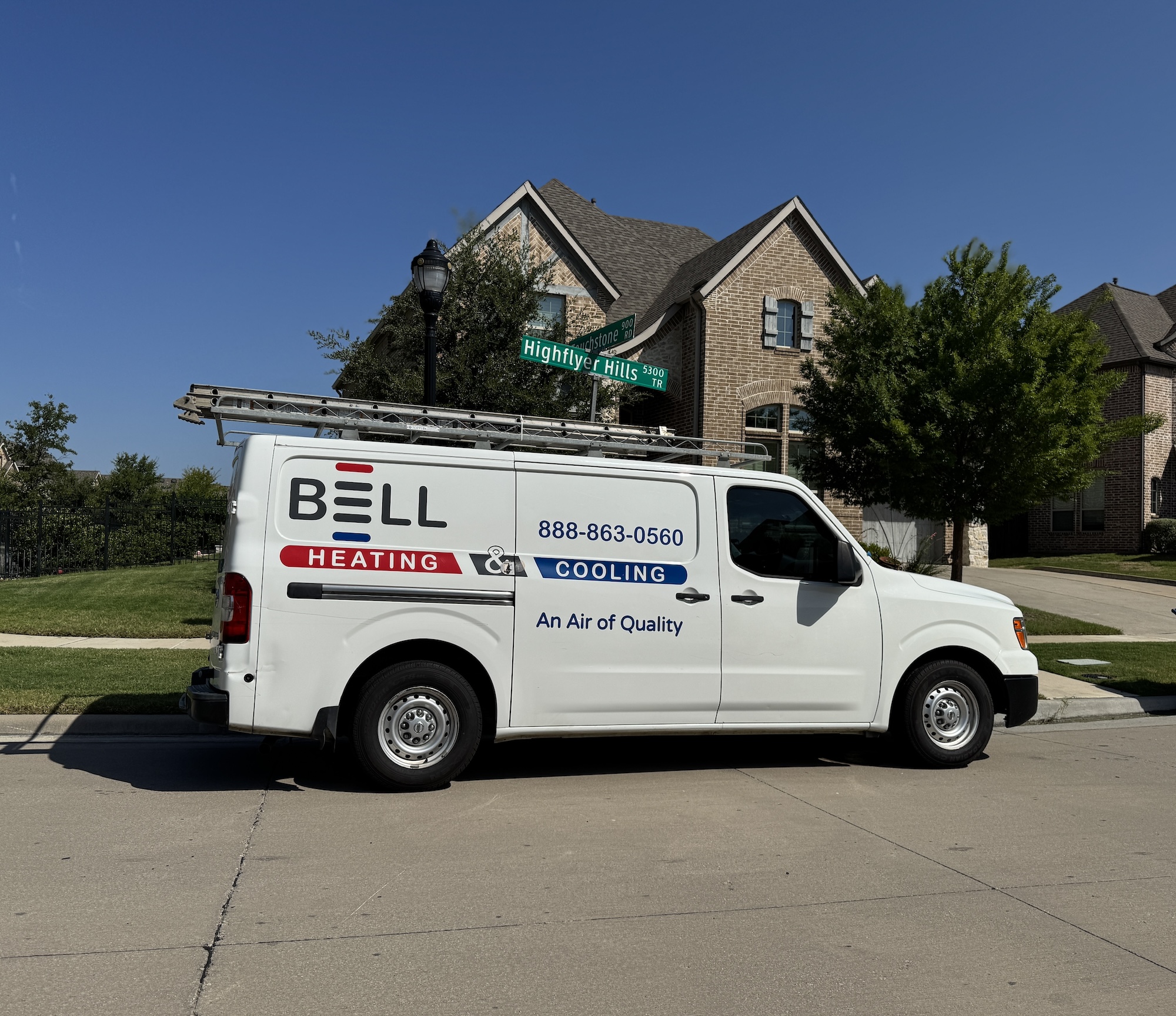 Bell Mechanical Services van parked in a residential driveway