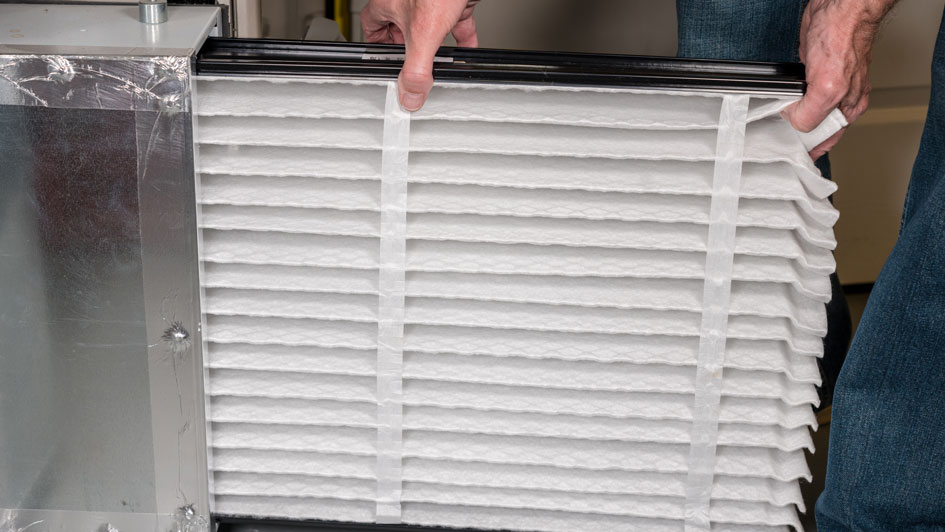 A fresh HVAC air filter ready to be installed to improve indoor air quality