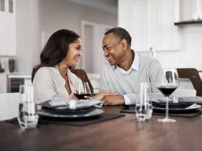 Couple enjoying a meal in a home with clean, filtered air