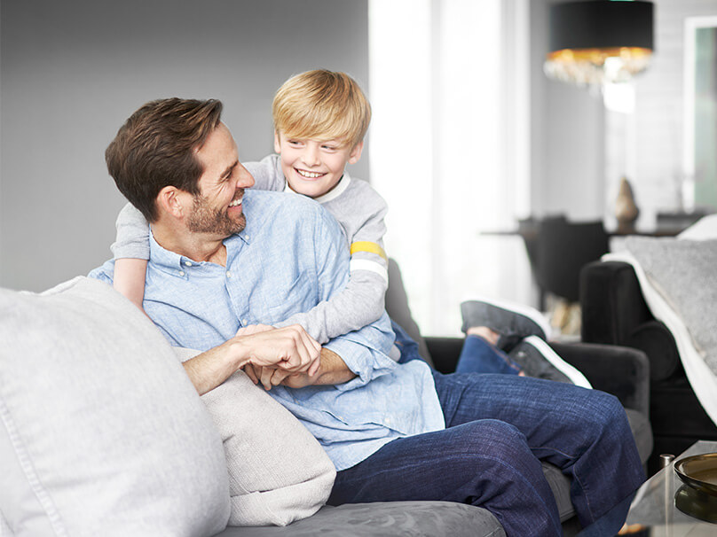 Father and child comfortable at home with quiet, even airflow