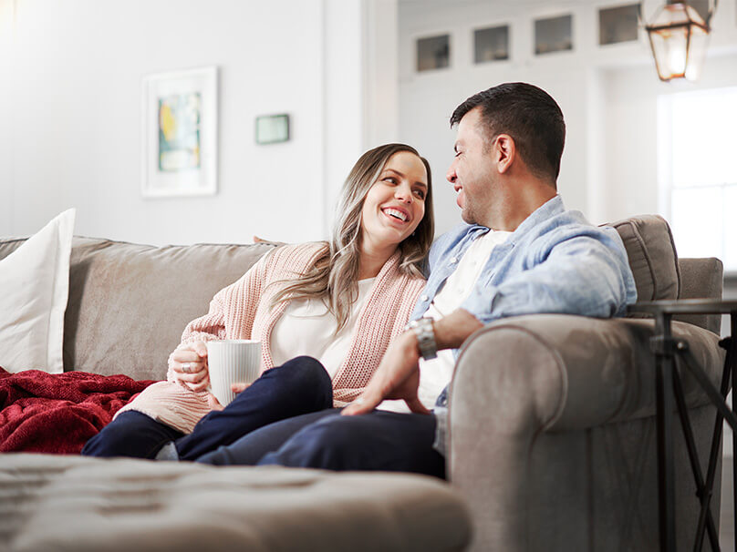 Couple enjoying steady year-round comfort at home