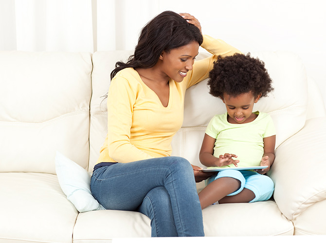 Mother and child comfortable in a room with ductless cooling